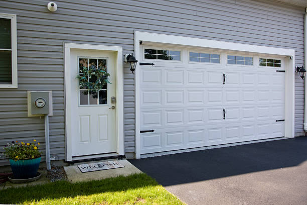24/7 Emergency Garage Door Panel Replacement experts in Hoxie, KS